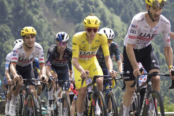 GC riders Almeida, Roglic, Pogacar and Yates racing in the 2024 Tour de France peloton